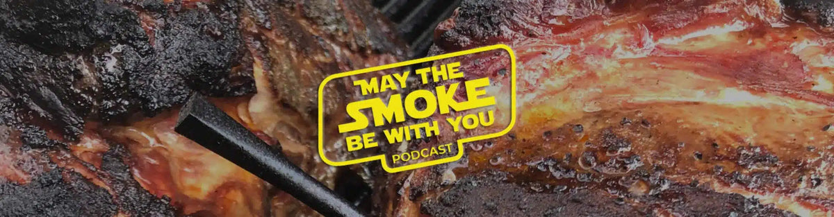 Grilled meat with charred exterior and yellow podcast logo "May The Smoke Be With You" overlaid on smoky barbecue background