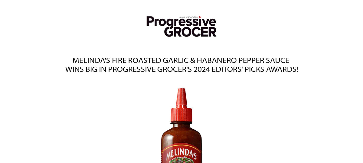 Melinda's hot sauce bottle with red cap against white background, featuring Progressive Grocer logo and award...