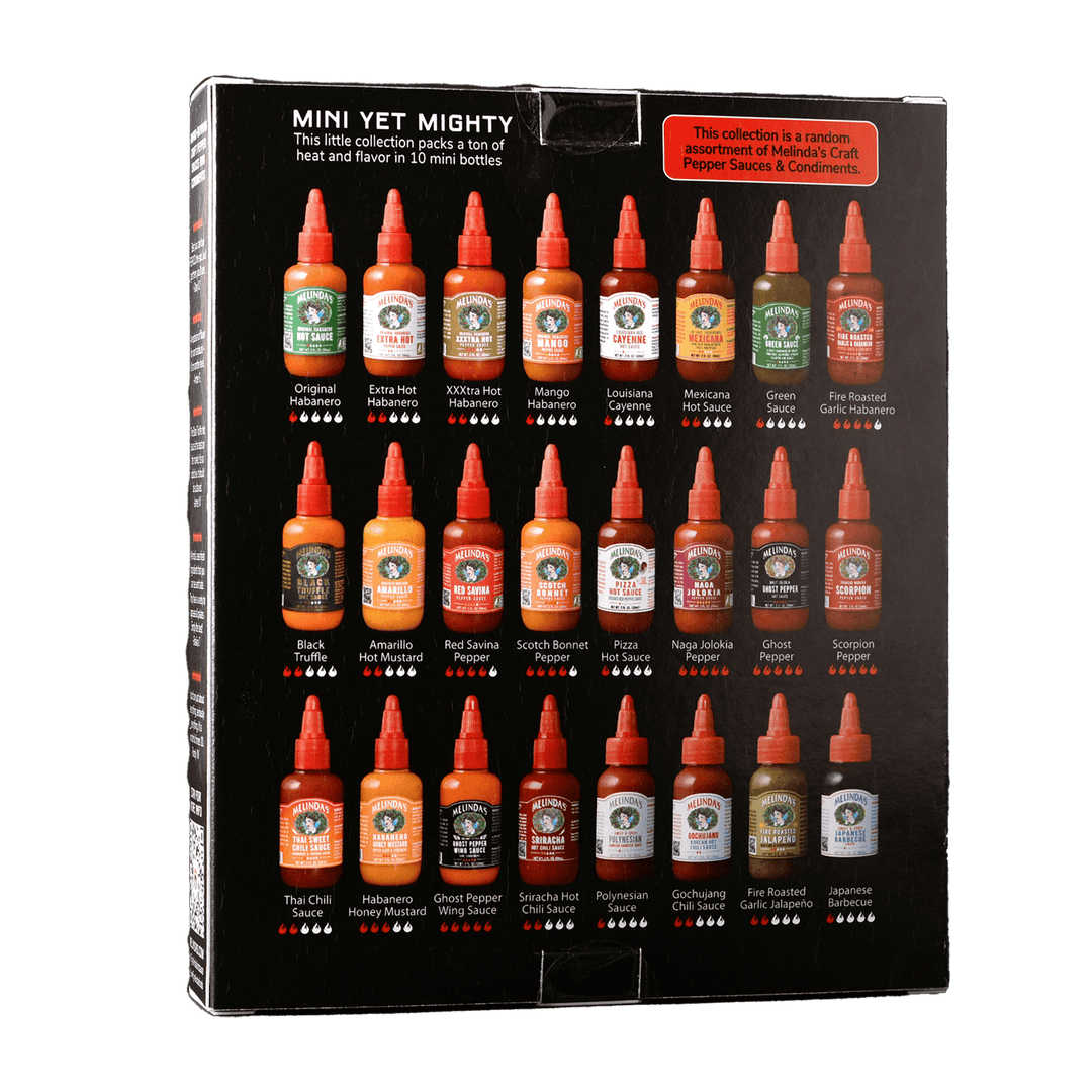 Box of 24 mini hot sauce bottles from Melinda's featuring various flavors with heat level indicators, labeled "Mini Yet...