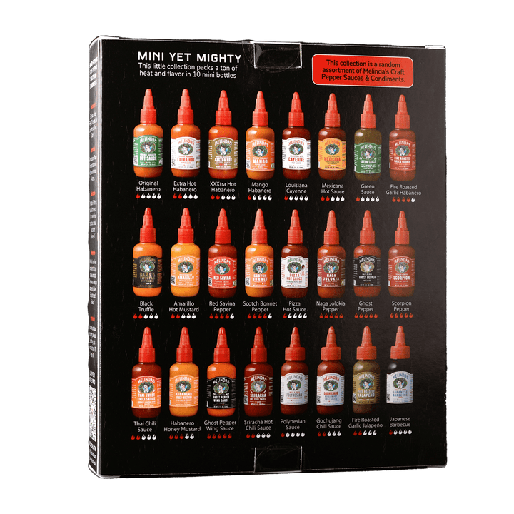 Box of 24 mini hot sauce bottles from Melinda's featuring various flavors with heat level indicators, labeled "Mini Yet...