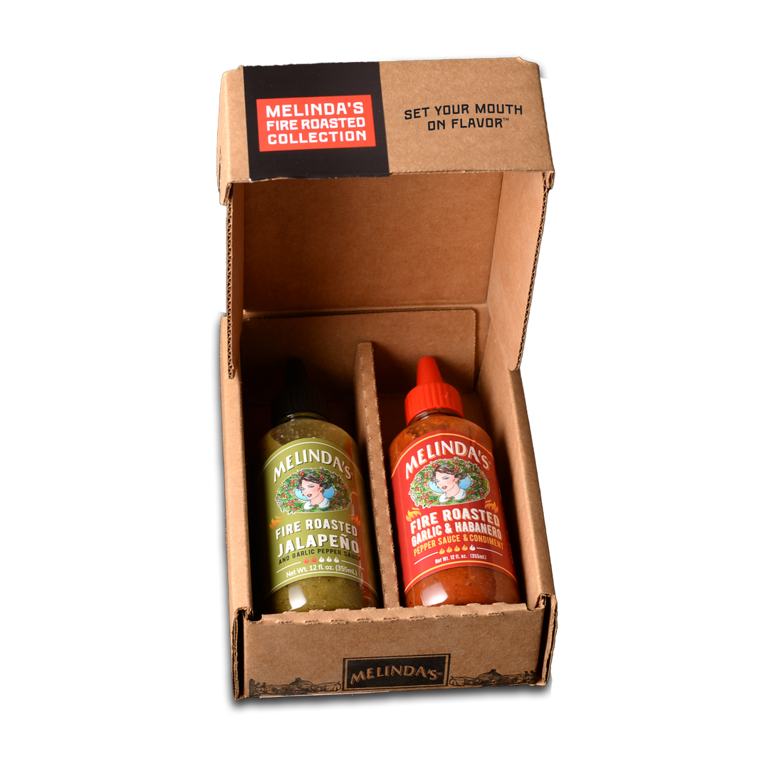 Melinda's Fire Roasted Collection gift box containing two hot sauce bottles - jalapeño and garlic habanero flavors