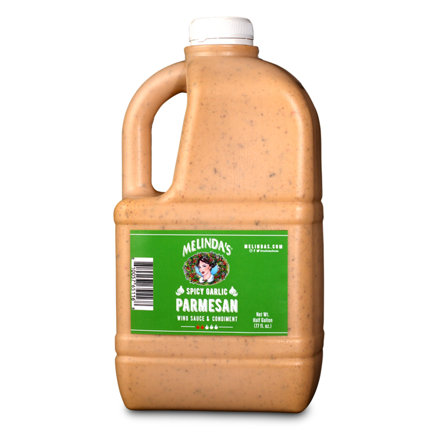 Half-gallon jug of Melinda's Spicy Garlic Parmesan wing sauce with green label and white cap