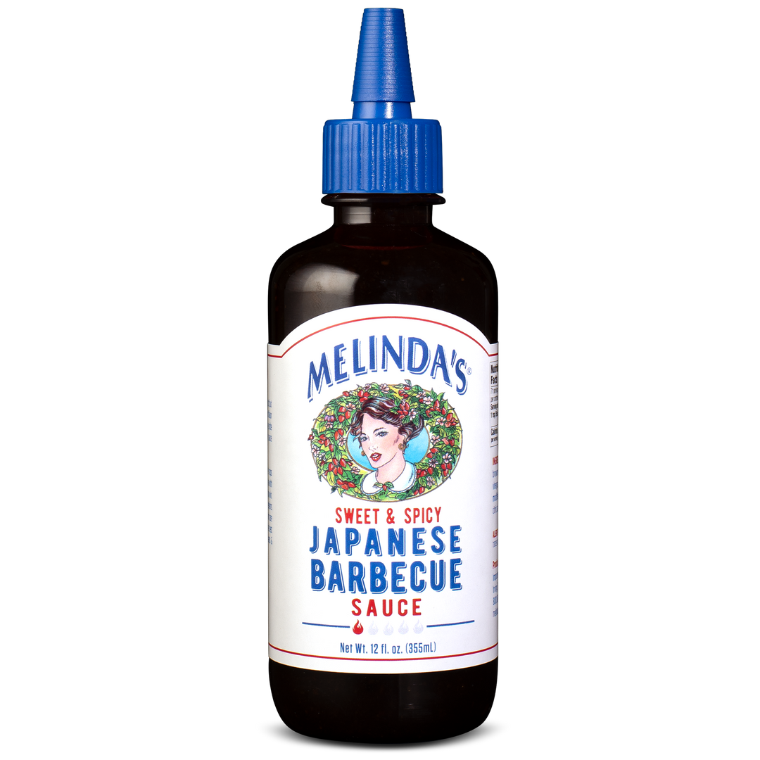 Melinda's Sweet & Spicy Japanese Barbecue Sauce bottle with blue cap and white label featuring woman's portrait