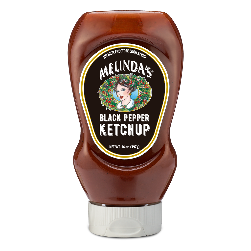 Melinda's Black Pepper Ketchup bottle, 14 oz, with dark brown ketchup and black label featuring woman's portrait