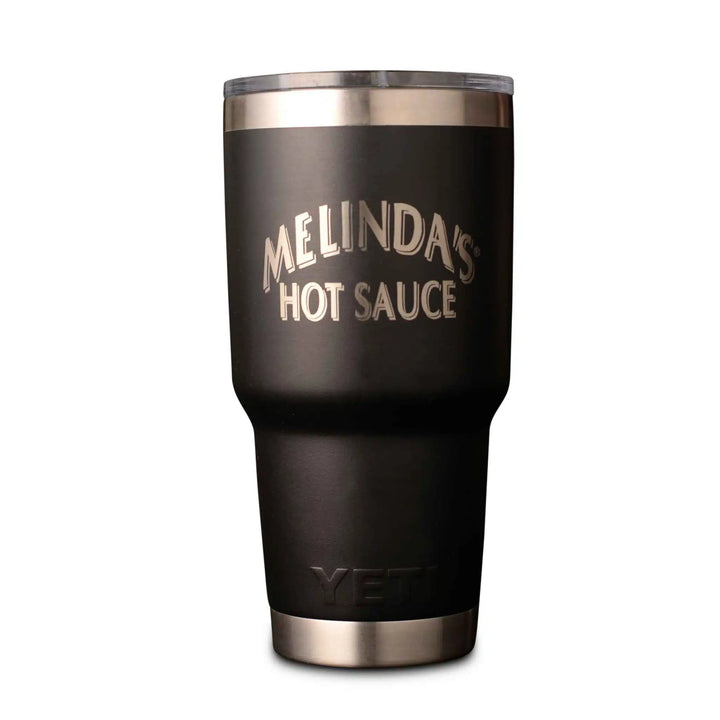 Black insulated tumbler with copper rim and "MELINDA'S HOT SAUCE" text engraved on front