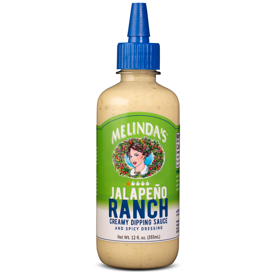 Melinda's Jalapeño Ranch creamy dipping sauce and spicy dressing in 12 fl oz bottle with blue squeeze cap