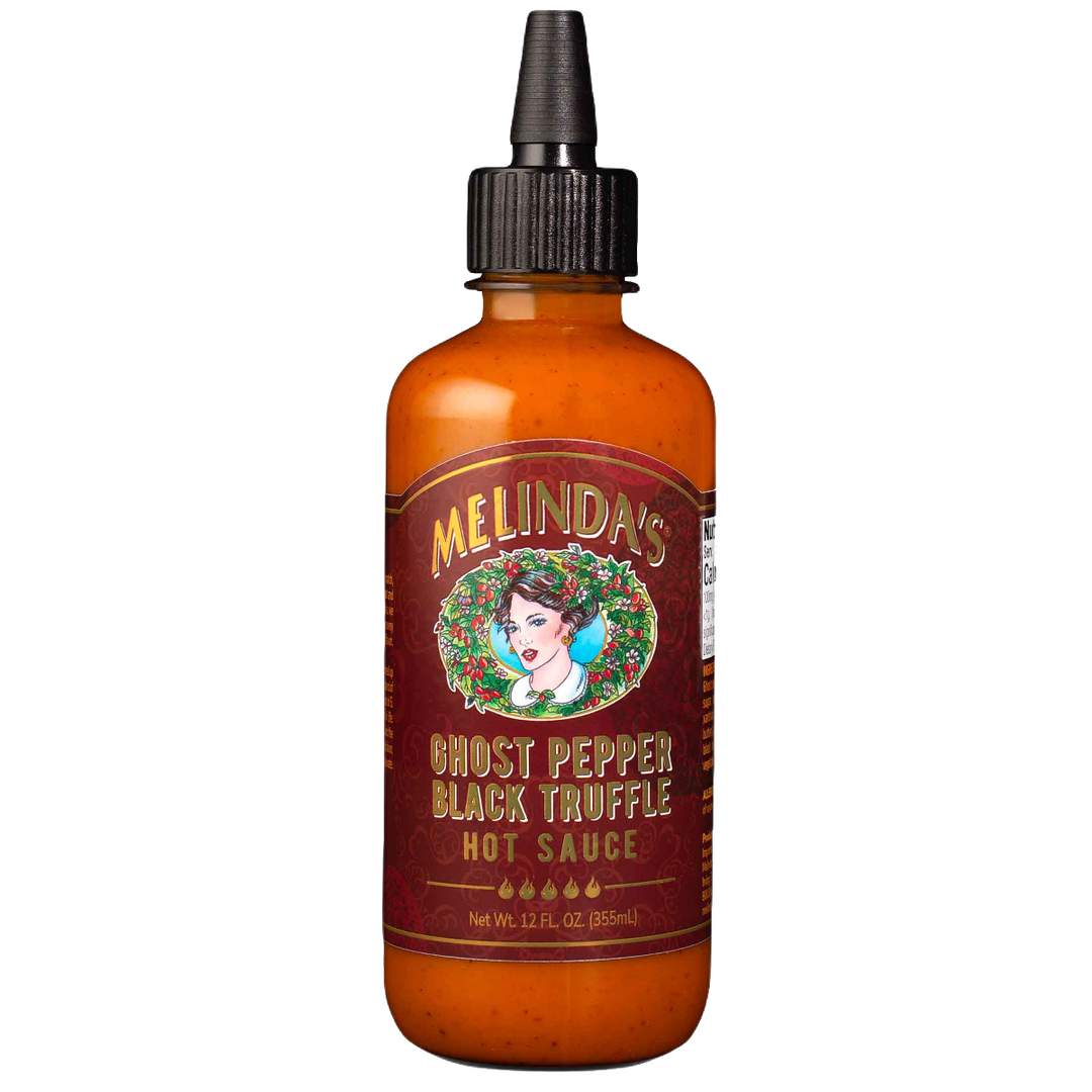Melinda's Ghost Pepper Black Truffle Hot Sauce bottle with amber glass, black dropper cap, and red label featuring...