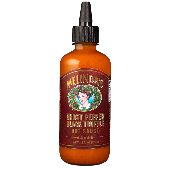 Melinda's Ghost Pepper Black Truffle Hot Sauce bottle with amber glass, black dropper cap, and red label featuring...