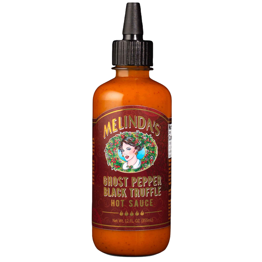 Melinda's Ghost Pepper Black Truffle Hot Sauce bottle with amber glass, black dropper cap, and red label featuring...