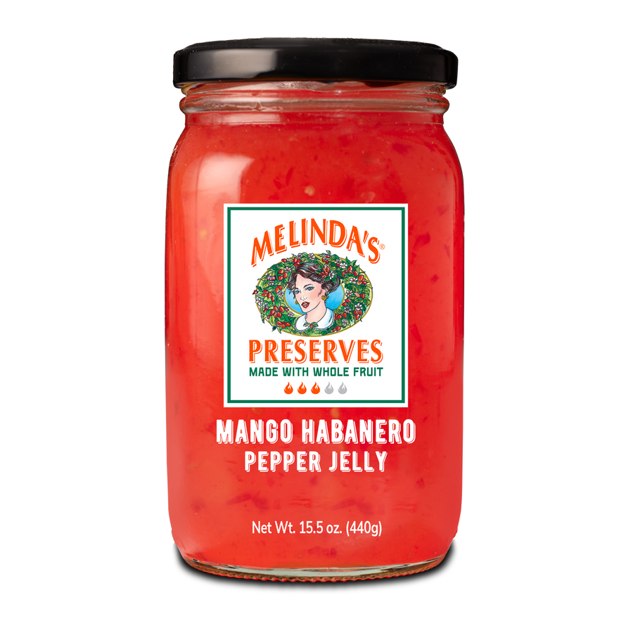 Jar of Melinda's Mango Habanero Pepper Jelly with red contents, black lid, and colorful label featuring woman's portrait
