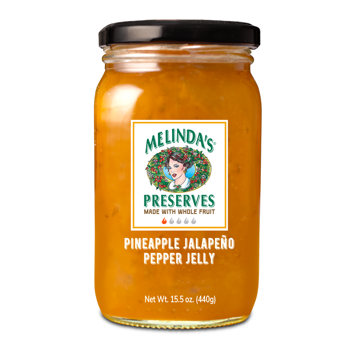 Melinda's Pineapple Jalapeño Pepper Jelly jar with orange contents, white label, and black lid, 15.5 oz size