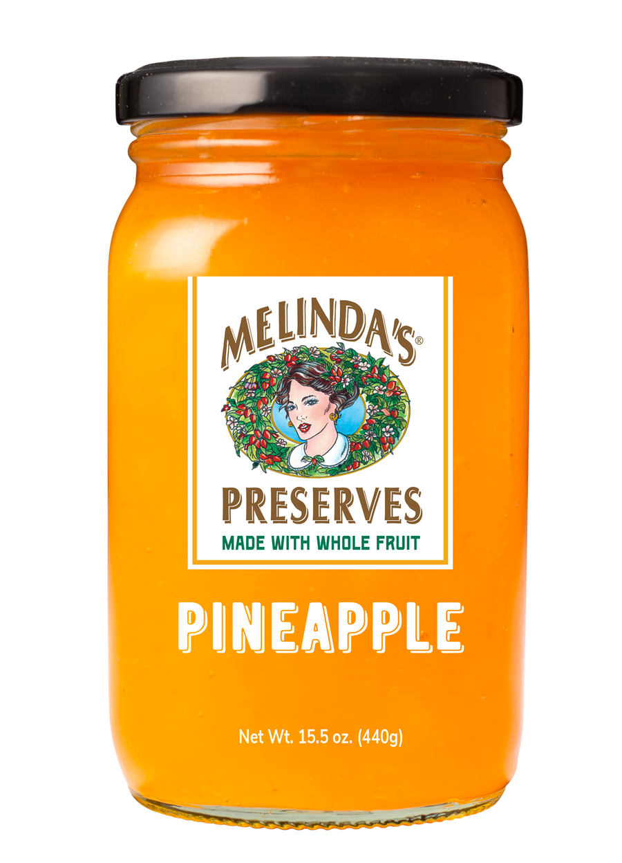 Melinda's Pineapple Preserves jar with orange contents, black lid, and white label featuring the Melinda's logo