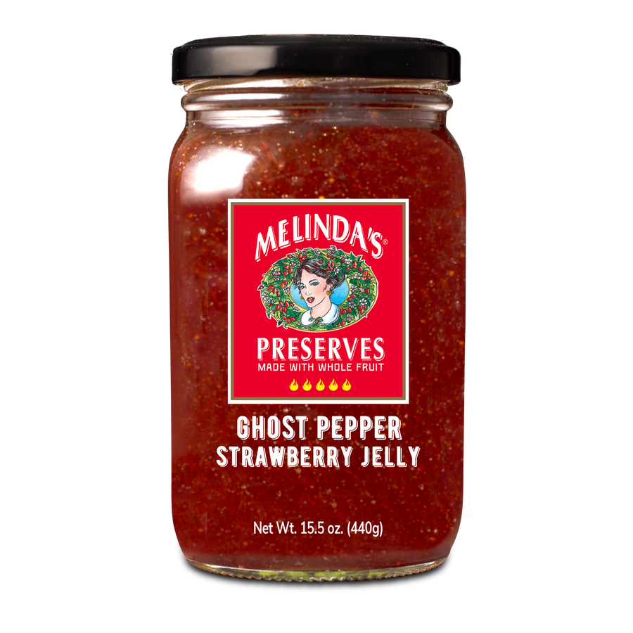 Jar of Melinda's Ghost Pepper Strawberry Jelly preserve with red label featuring woman's portrait, 15.5 oz size