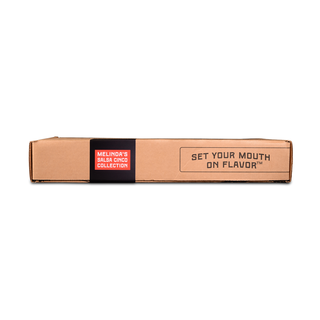 Brown cardboard shipping box with black band reading "MELINDA'S SALSA CINCO COLLECTION" and "SET YOUR MOUTH ON FLAVOR" text