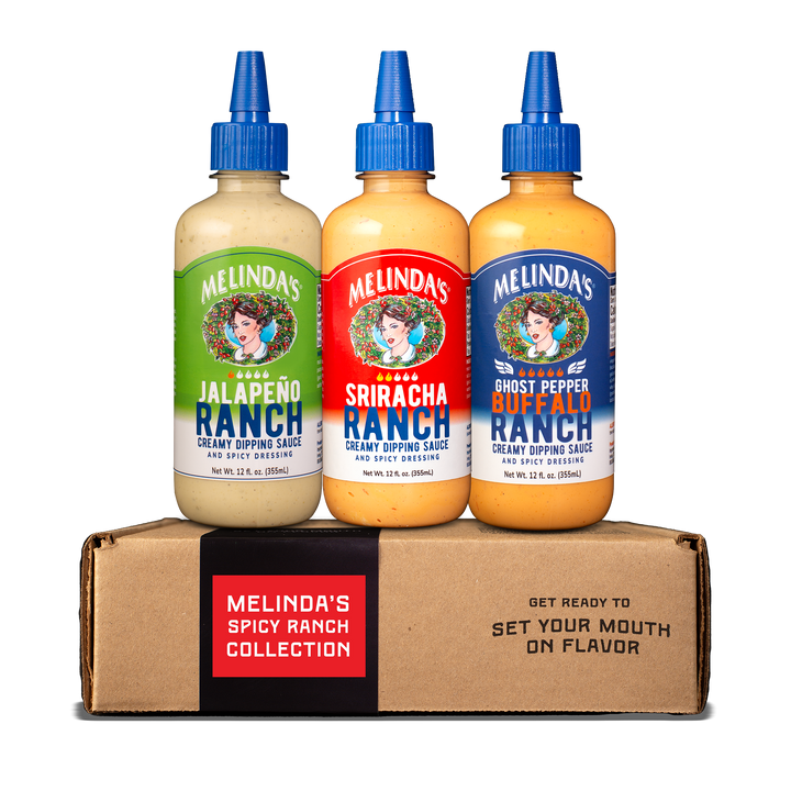 Three bottles of Melinda's Spicy Ranch Collection sauces in Jalapeño, Sriracha, and Ghost Pepper Buffalo flavors on...