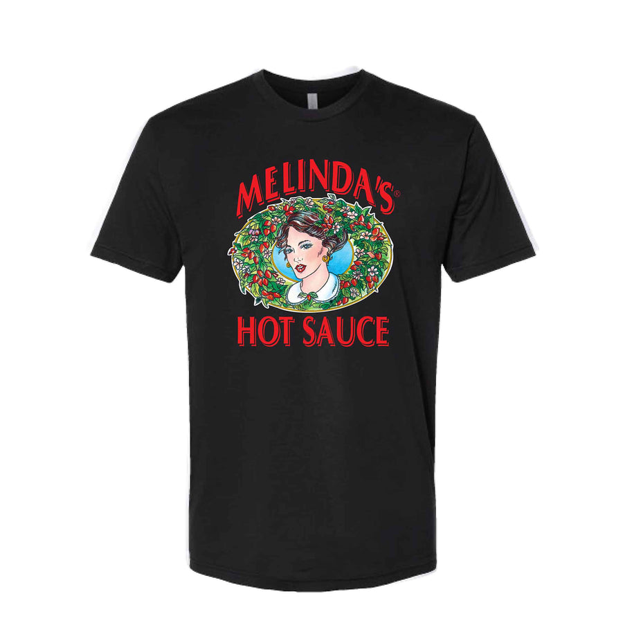 Black t-shirt with Melinda's Hot Sauce logo featuring a woman's portrait surrounded by a wreath of peppers and vegetables