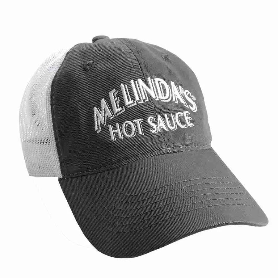 A Melinda's Snap Back Hat - Heathered Grey displayed on a table.