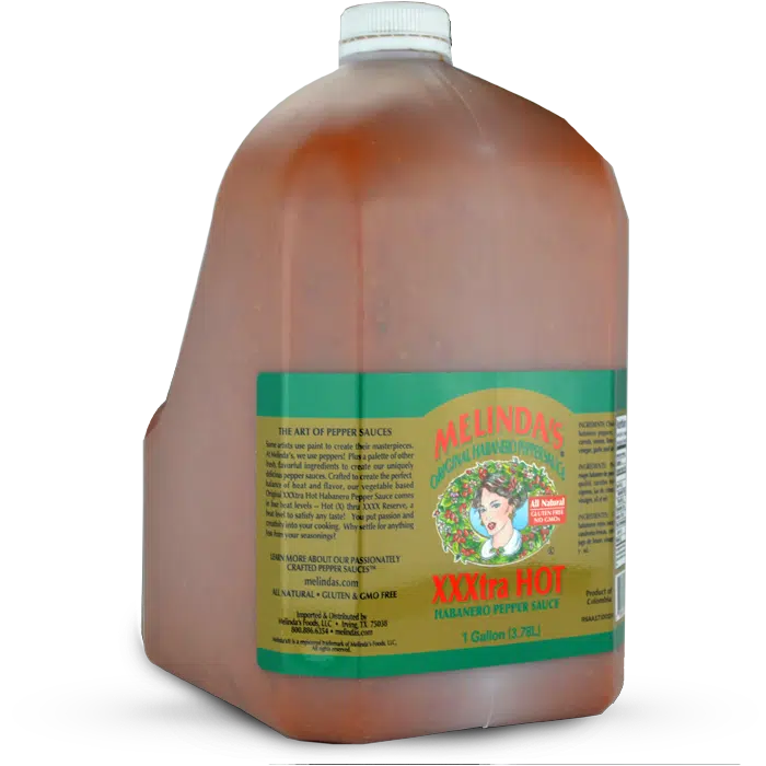 Large gallon jug of Melinda's XXTRA Hot Habanero Pepper Sauce with green and yellow label featuring woman's face